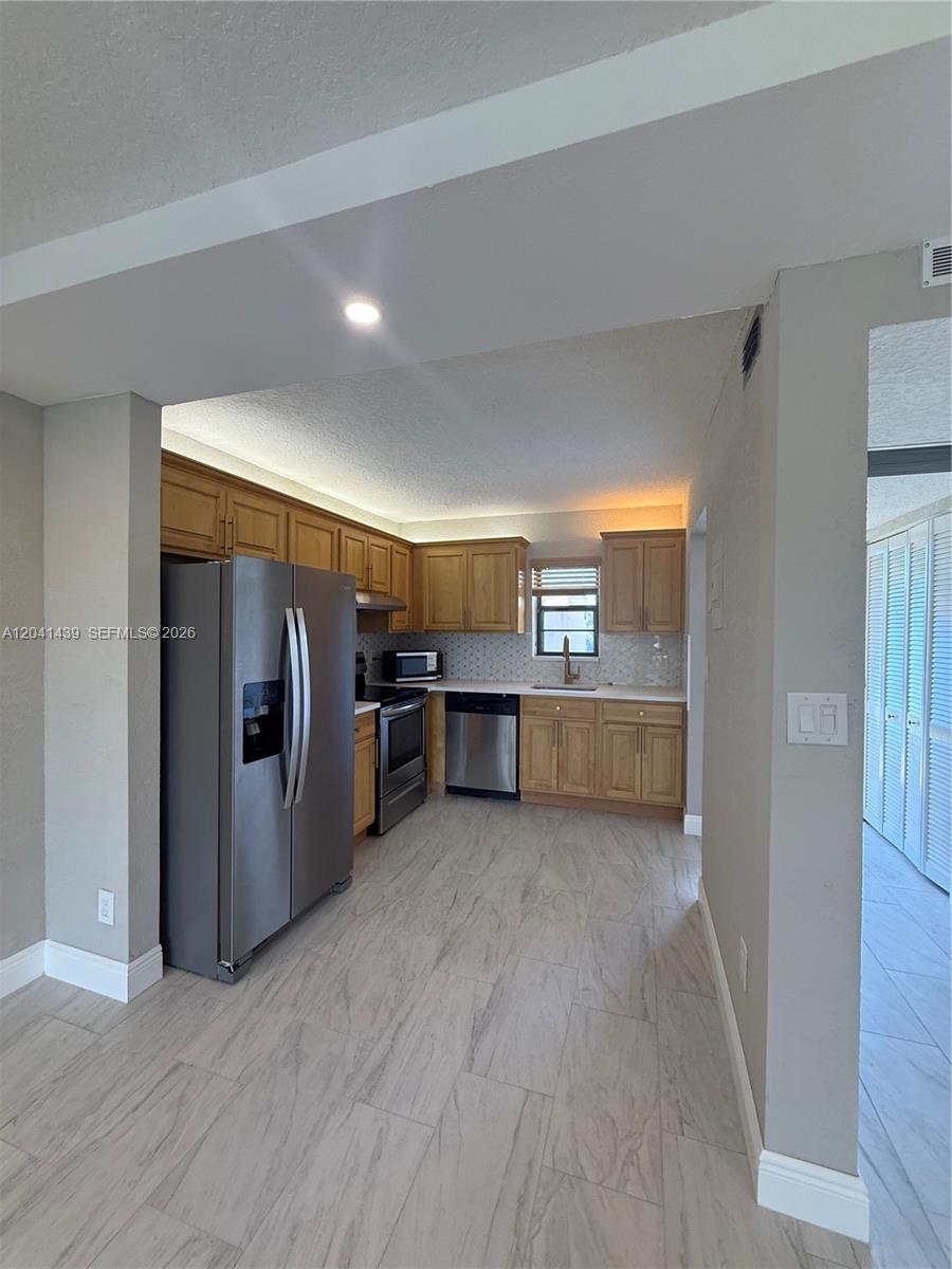 9273 Southwest 8th Street, Unit 311 Boca Raton, FL 33428 - Photo 3 of 17