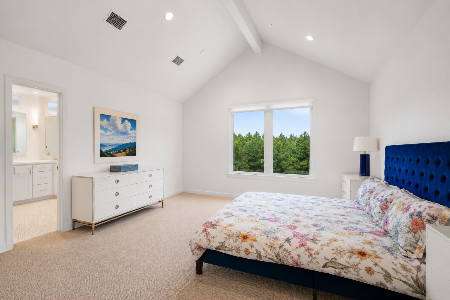 2520 Sutherland Street Austin, TX 78746 - Photo 15 of 26 A tranquil bedroom features soaring vaulted ceilings and a serene greenbelt view. Motorized shades are at the touch of a button. .