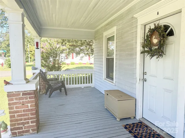 a view of a living room and a window