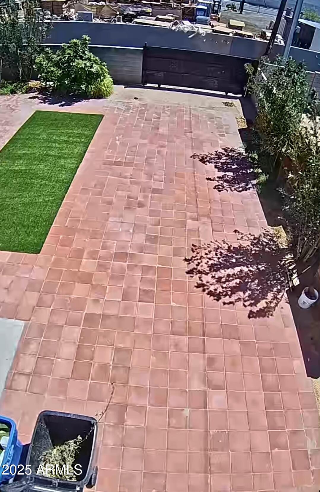 1825 East Adams Street Phoenix, AZ 85034 - Photo 19 of 22 a view of a yard with plants and brick wall