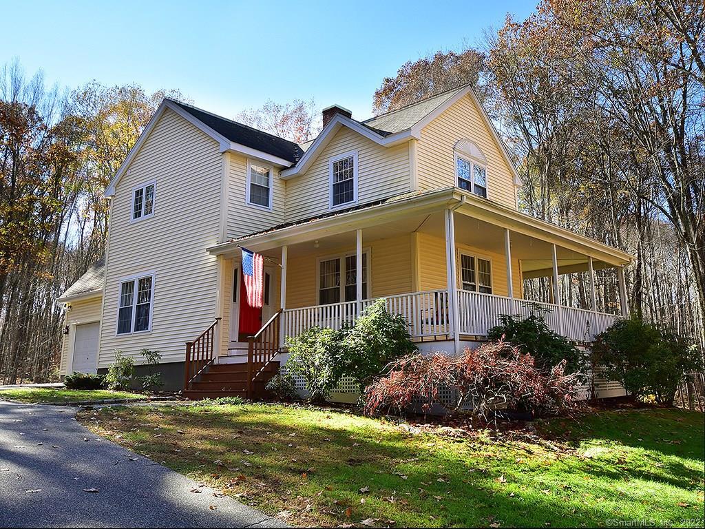 227 Stearns Road Mansfield, CT 06250 - Photo 1 of 1 a front view of a house with a yard and garage