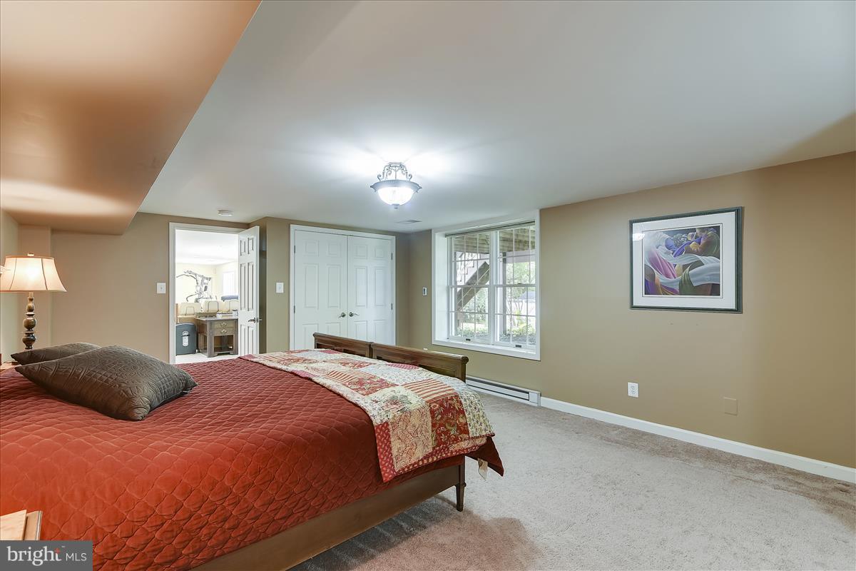 9409 Old Courthouse Road Vienna, VA 22182 - Photo 22 of 30 a bedroom with a bed and a window