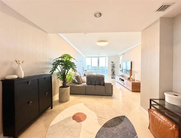 a living room with furniture and a couch