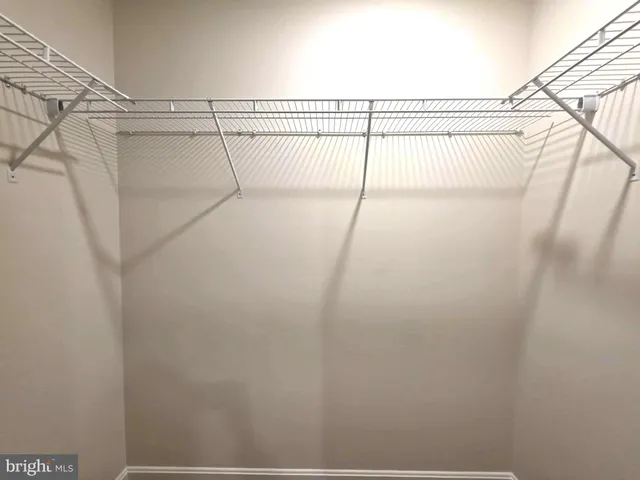 a view of a room with racks on the wall