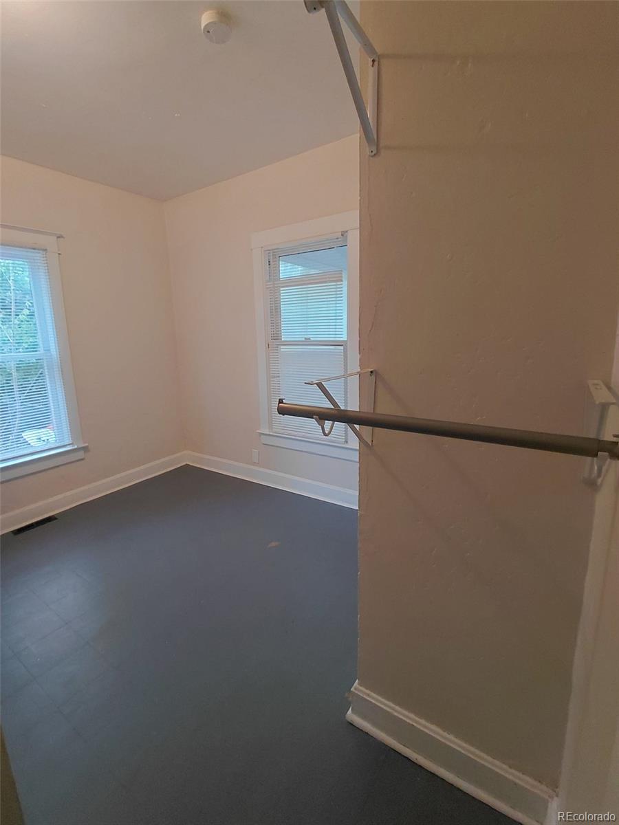 1917 South Fox Street Denver, CO 80223 - Photo 8 of 10 an empty room with a window