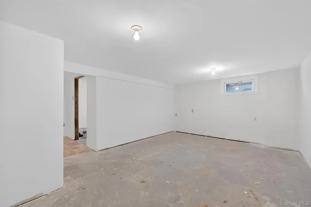 an empty room with an entryway