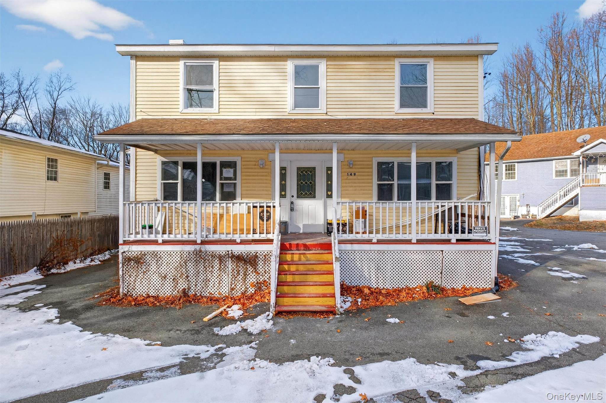 149 Lewis Lane, Unit 1 Wallkill, NY 12589 - Photo 2 of 23 front view of a house with a yard