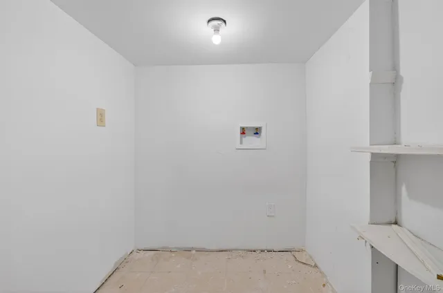 a view of wooden fence next to a yard