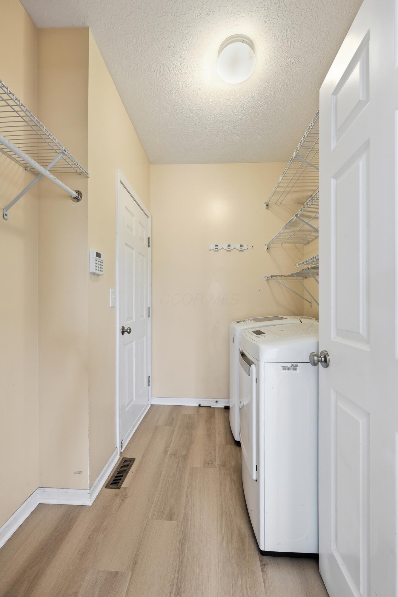 8104 Amanda Northern Road Northwest Canal Winchester, OH 43110 - Photo 17 of 27 First floor laundry room leads to garage
