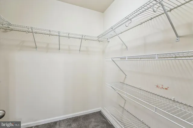 a view of a room with racks on the wall