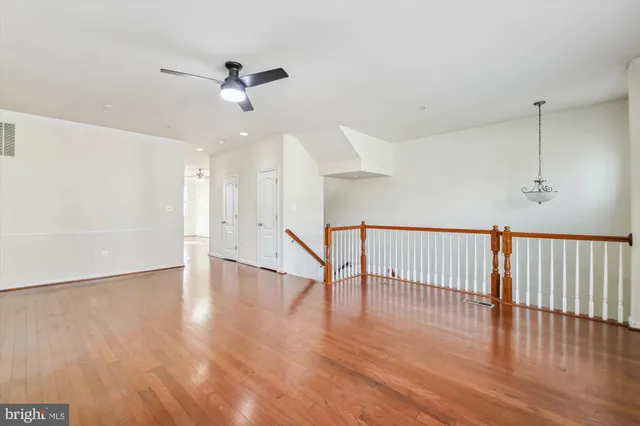 a view of an entryway with wooden floor