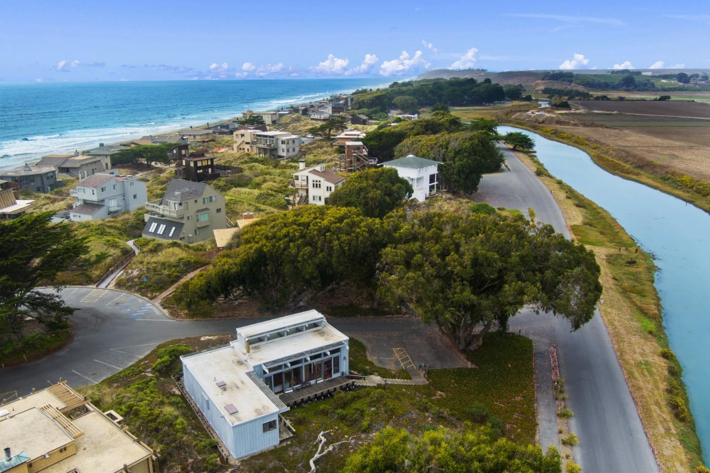 a view of a lake in middle of the town