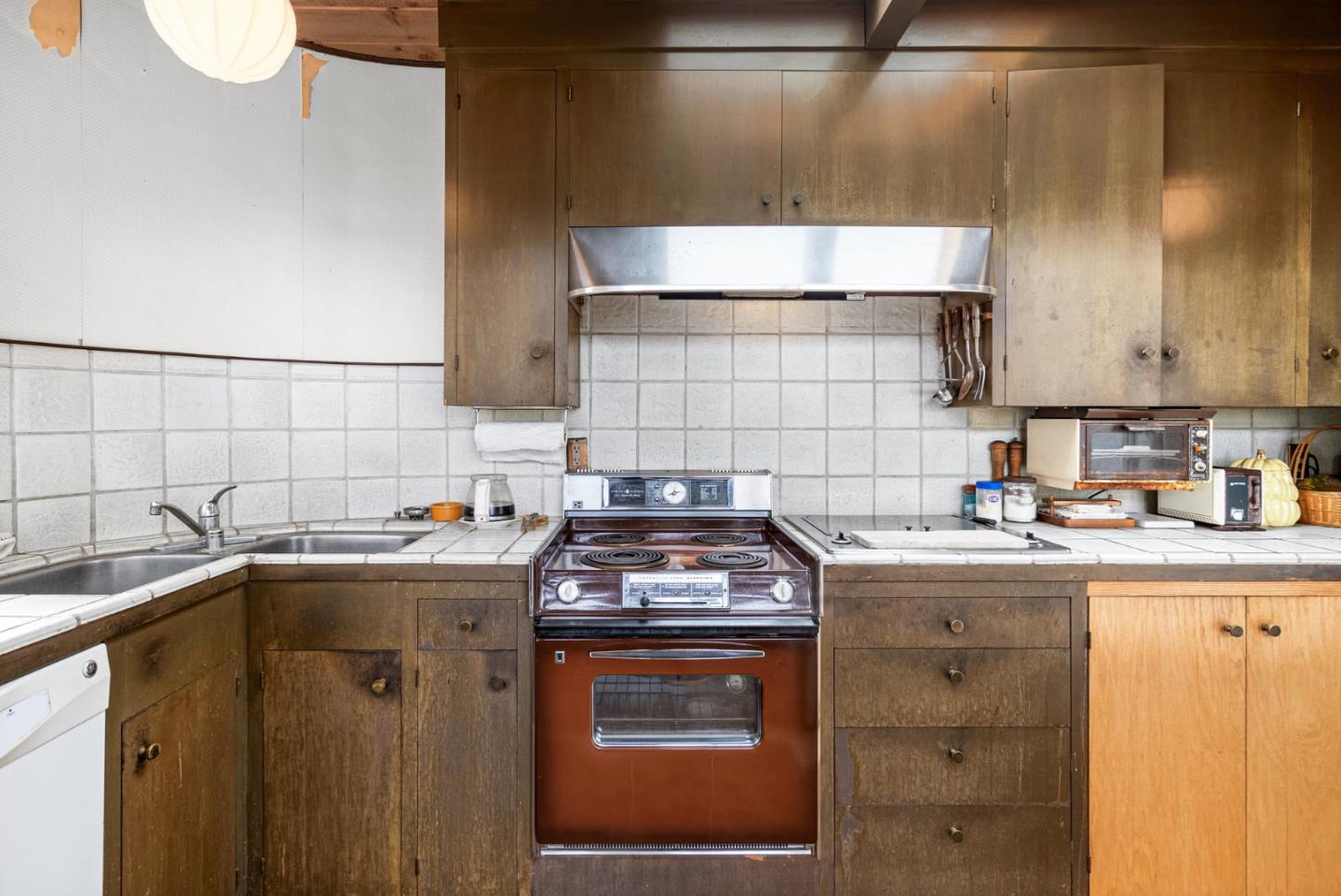 34 Sanderling Circle Watsonville, CA 95076 - Photo 12 of 56 a kitchen with a sink a stove and cabinets
