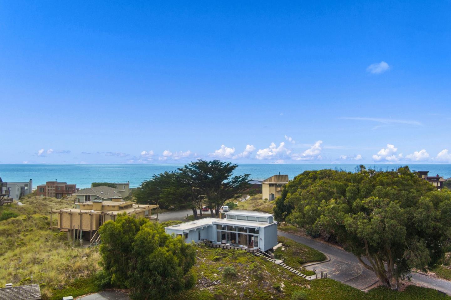 34 Sanderling Circle Watsonville, CA 95076 - Photo 2 of 56 a view of a lake with a house in the background