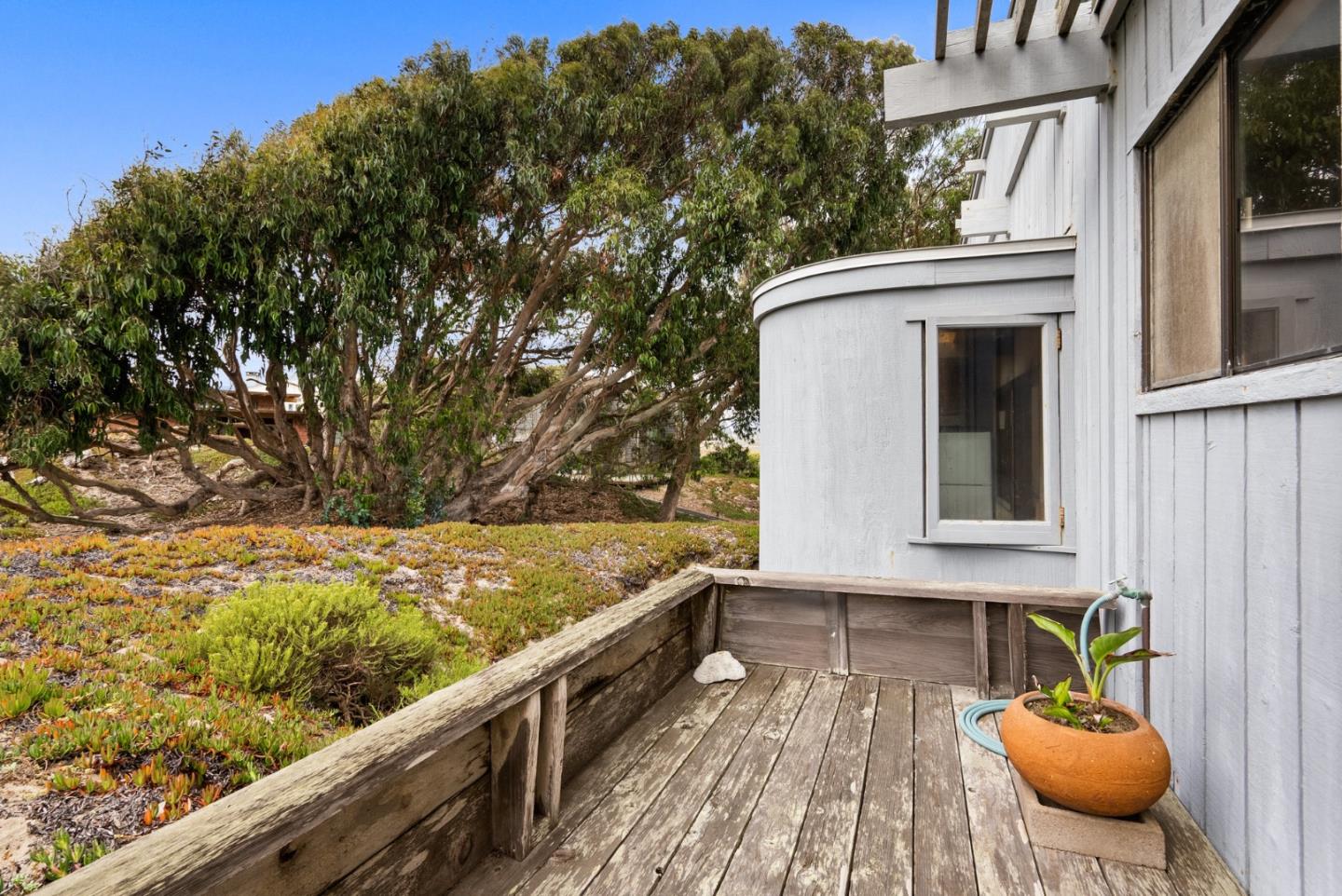 34 Sanderling Circle Watsonville, CA 95076 - Photo 25 of 56 a view of a balcony with two chairs and a wooden fence