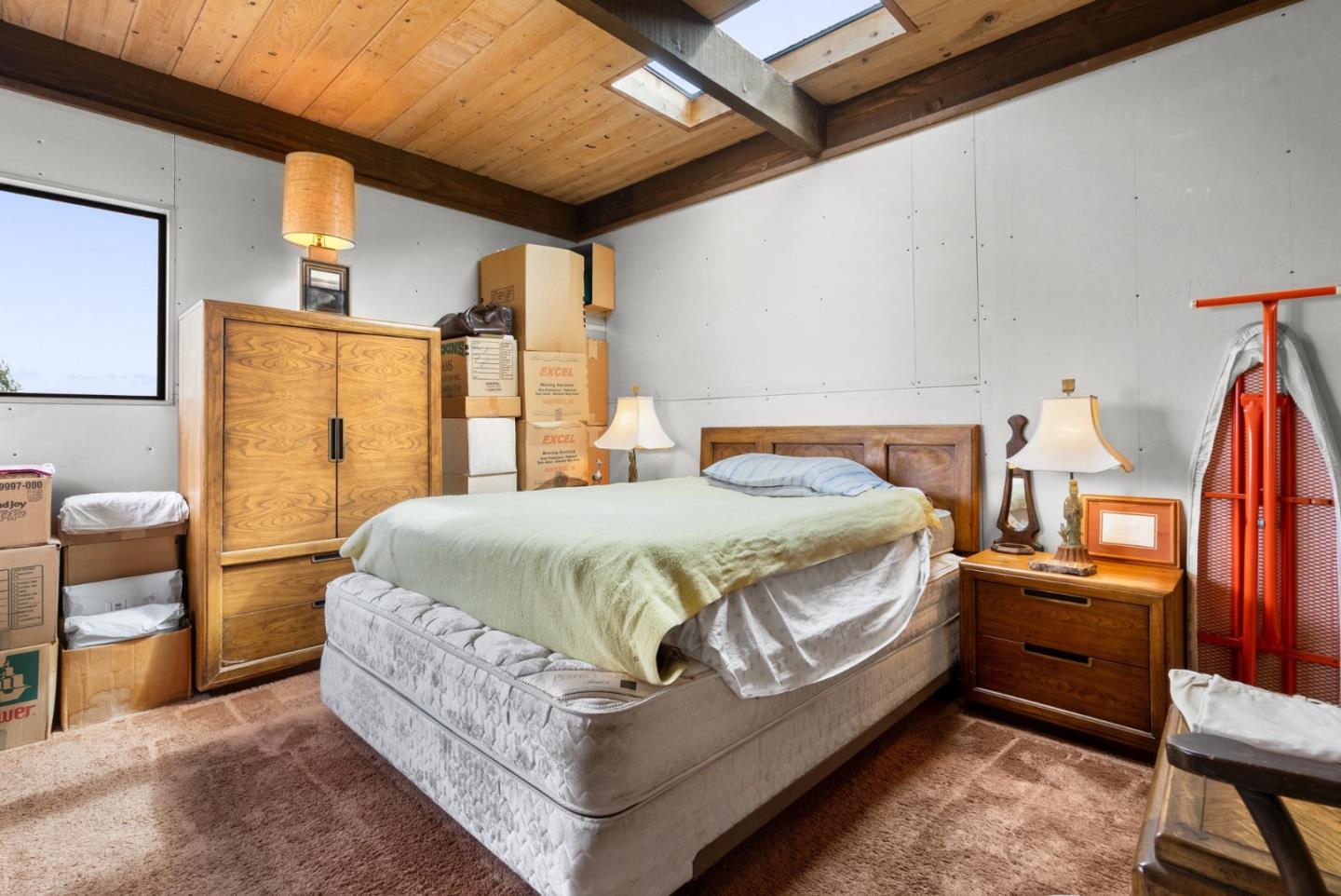 34 Sanderling Circle Watsonville, CA 95076 - Photo 30 of 56 a bed sitting in a bedroom next to a window