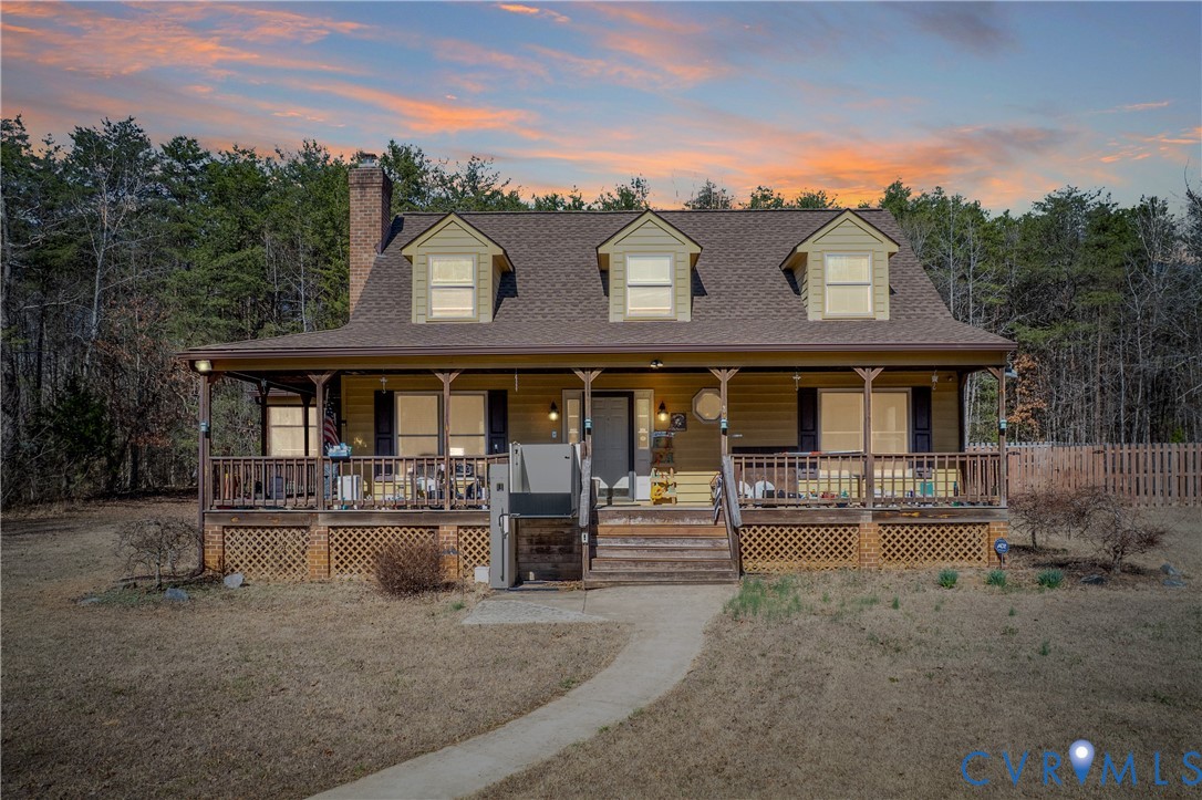 5612 Whitesell Road Louisa, VA 23093 - Photo 1 of 26 a front view of a house with garden