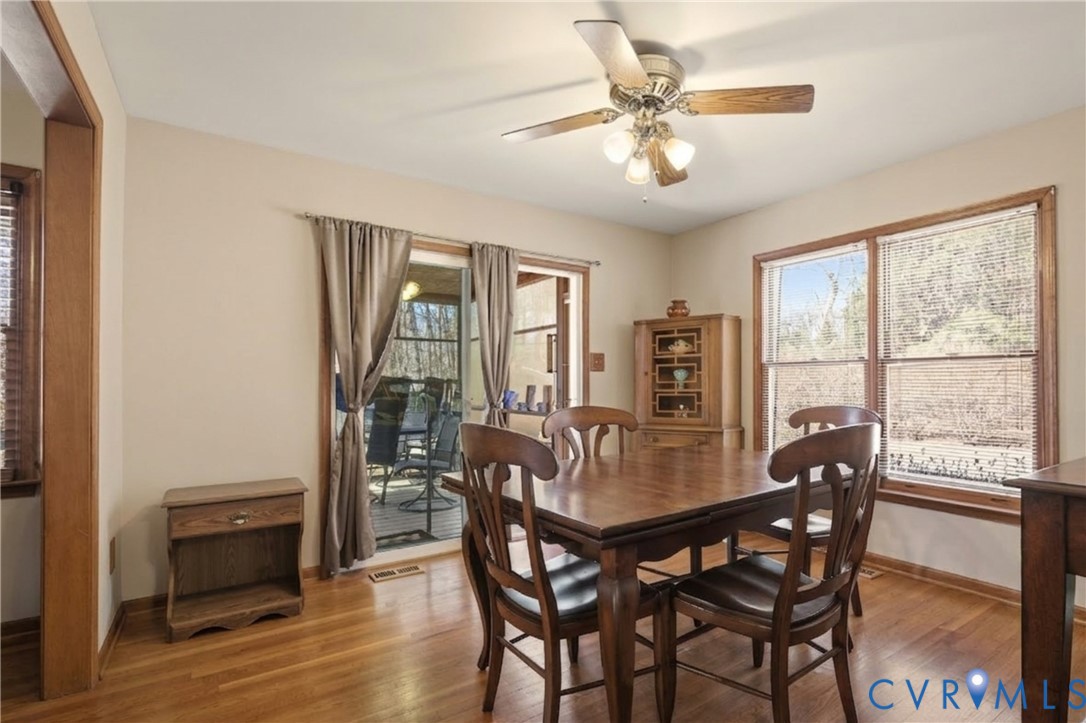 5612 Whitesell Road Louisa, VA 23093 - Photo 12 of 26 a view of a dining room with furniture window and wooden floor
