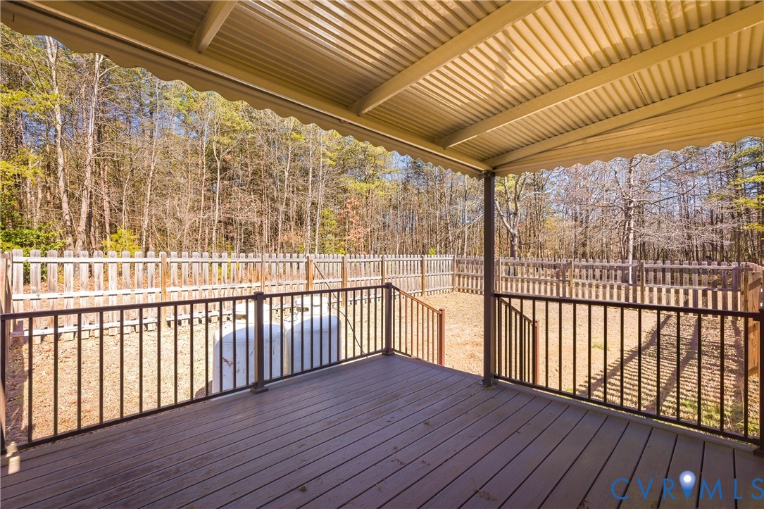 5612 Whitesell Road Louisa, VA 23093 - Photo 9 of 26 a view of a porch with wooden floor