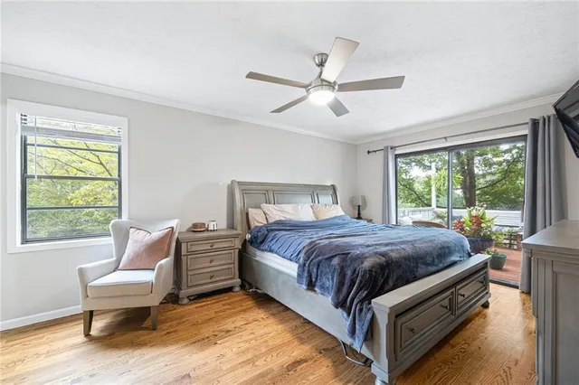 a bed room with a bed and a window