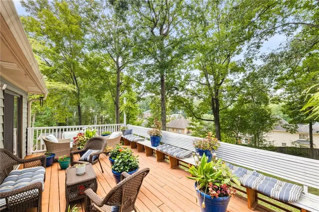 a view of a balcony with chairs