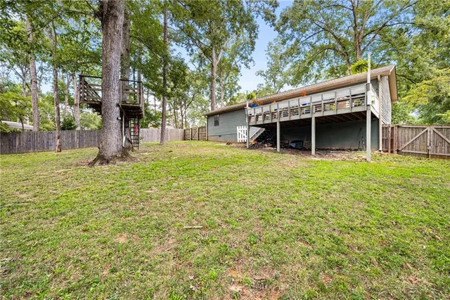 a house with trees in front of it
