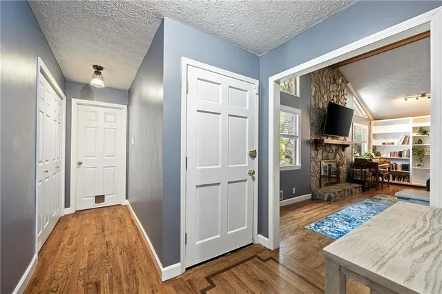 a view of livingroom with hardwood and furniture