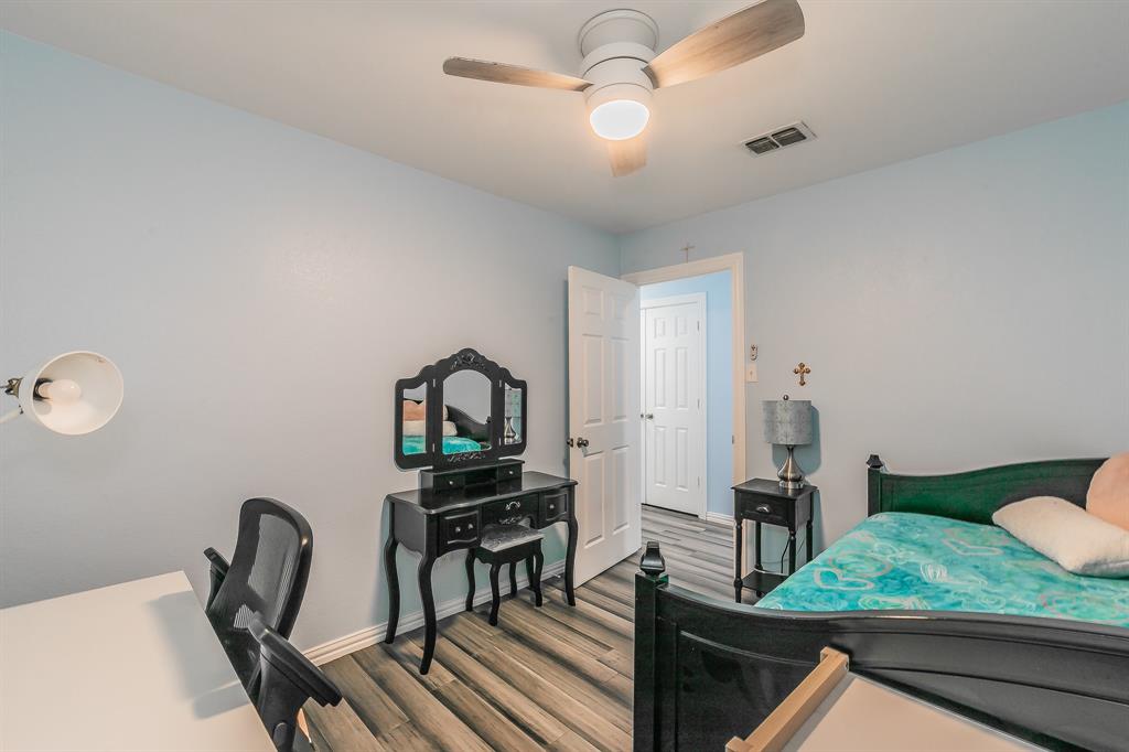 904 Sherman Street Tioga, TX 76271 - Photo 32 of 40 a view of a workspace with furniture