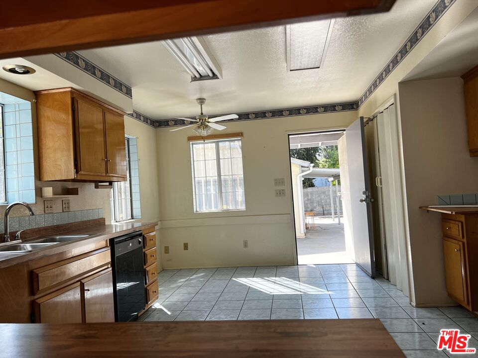 1151 Forest Avenue Pasadena, CA 91103 - Photo 7 of 15 a view of an empty room with wooden floor and a window