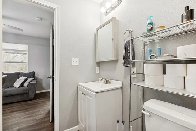 a view of a lake with houses in the back