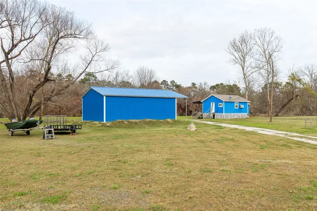 a house with trees in front of it