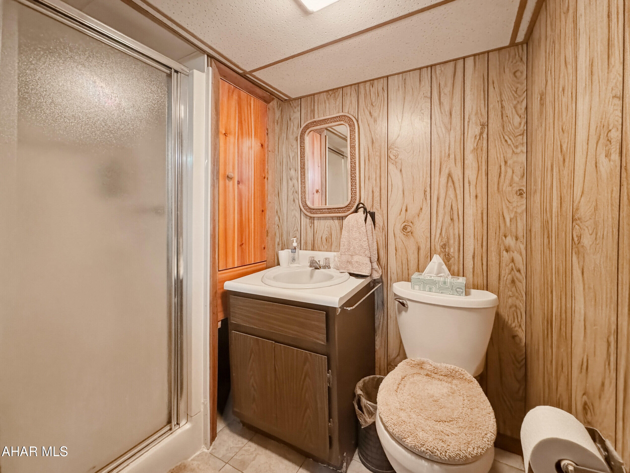 506 Ruby Street Windber, PA 15963 - Photo 32 of 38 a bathroom with a toilet a sink and a shower