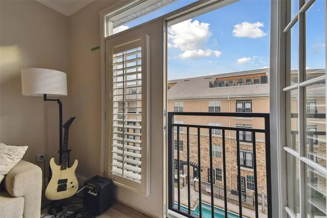 a view of a livingroom with furniture and window