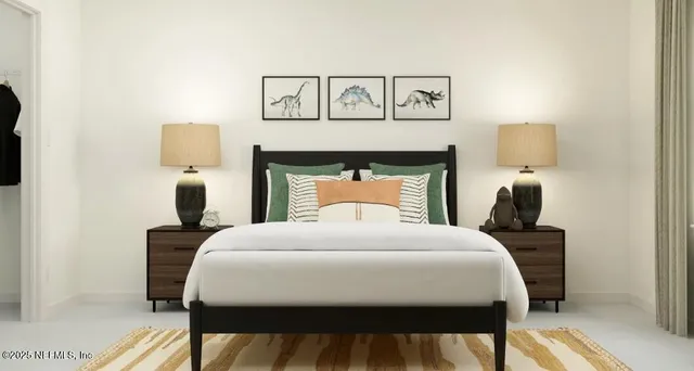 a bedroom with a bed and a night stand