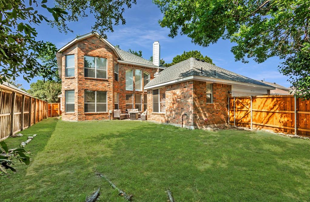 5916 Mossbrook Trail Dallas, TX 75252 - Photo 37 of 40 a front view of a house with a yard