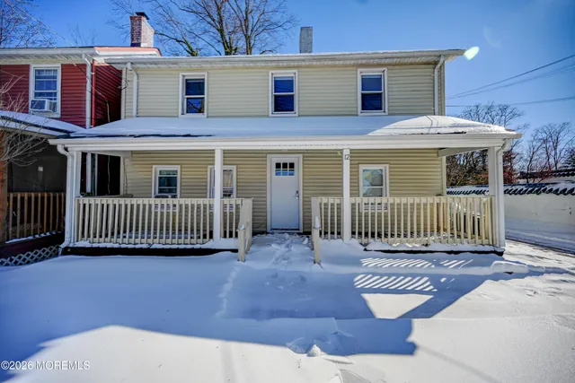 a view of a house with a porch