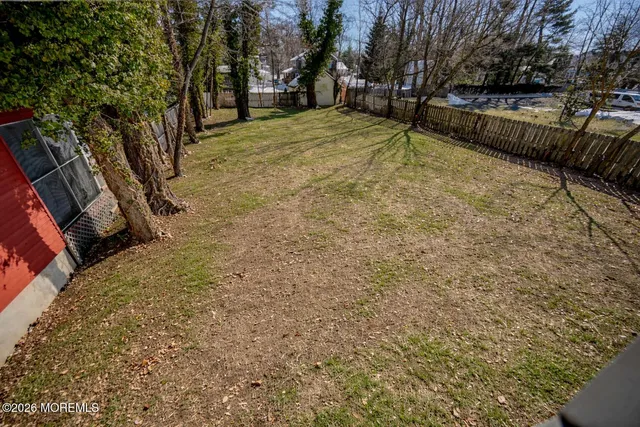 a view of a house with snow on the side