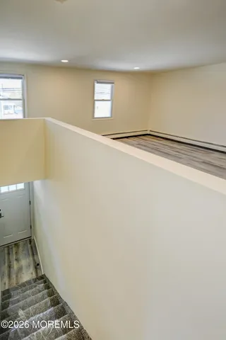 a view of entryway with stairs