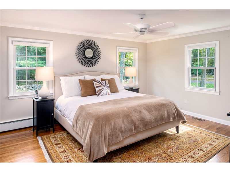 540 Cheese Spring Road New Canaan, CT 06840 - Photo 12 of 25 a bedroom with a bed and a window