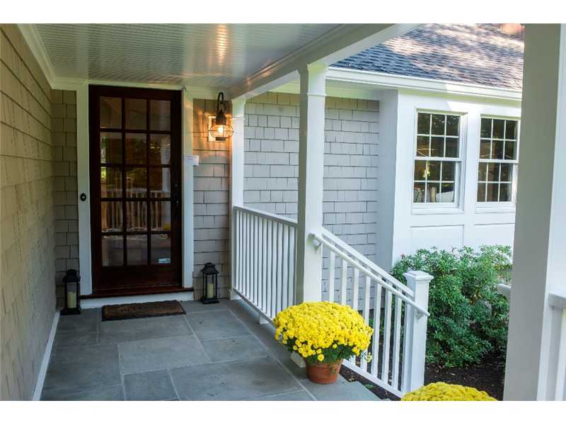 540 Cheese Spring Road New Canaan, CT 06840 - Photo 2 of 25 a view of a wooden door with a house