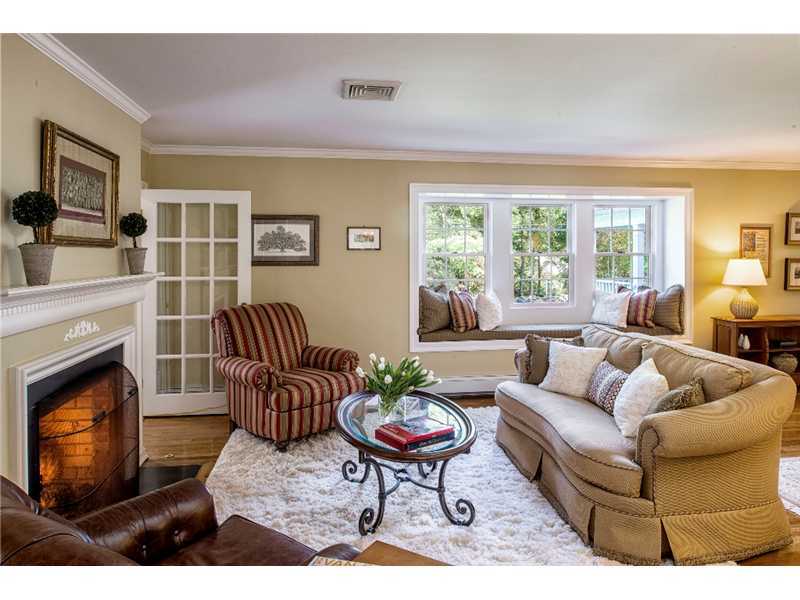 540 Cheese Spring Road New Canaan, CT 06840 - Photo 3 of 25 a living room with furniture a fireplace a rug and a window