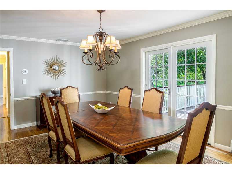 540 Cheese Spring Road New Canaan, CT 06840 - Photo 5 of 25 a view of a dining room with furniture a chandelier and wooden floor