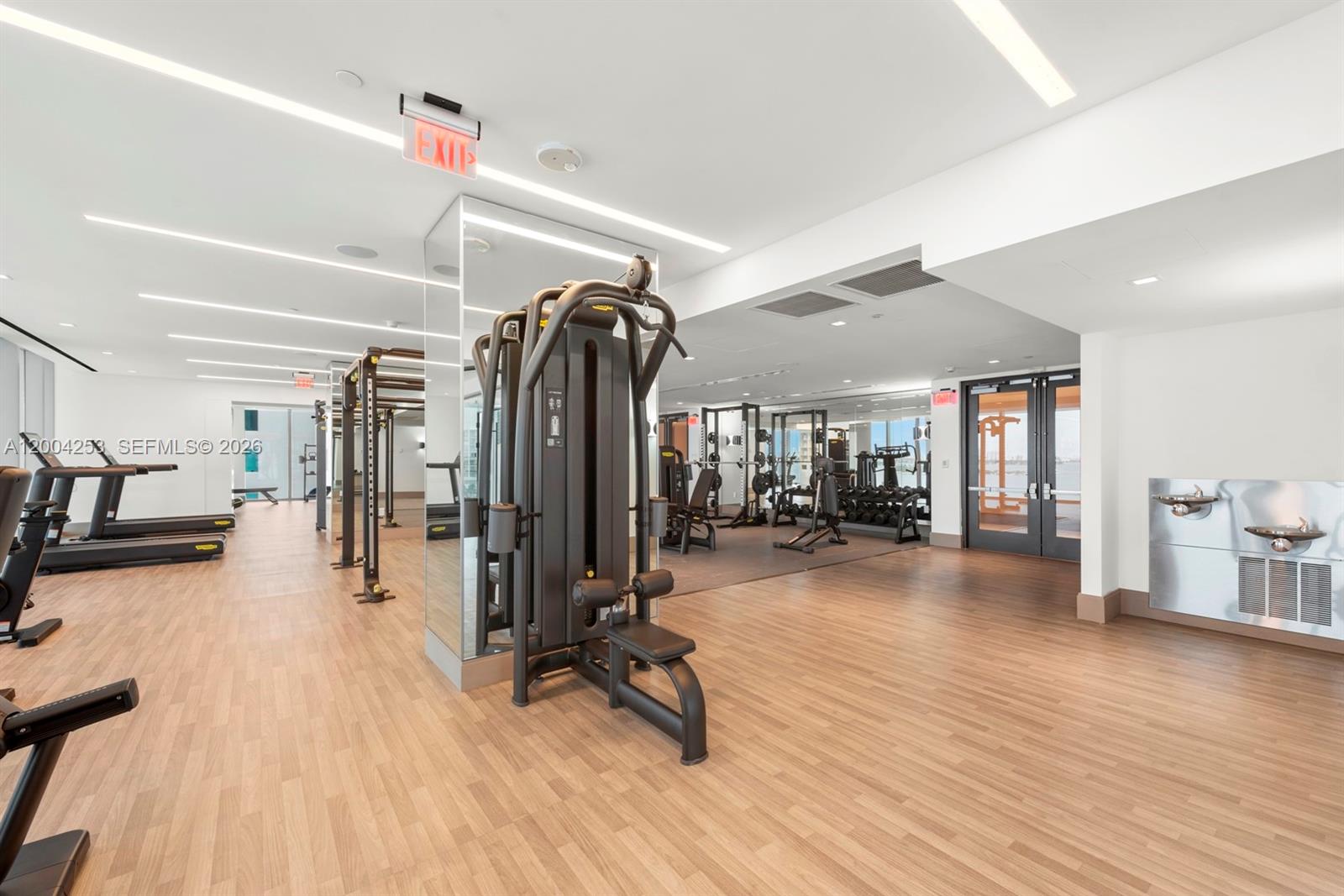 700 Northeast 26th Terrace, Unit TH403 Miami, FL 33137 - Photo 56 of 85 a view of a room with gym equipment