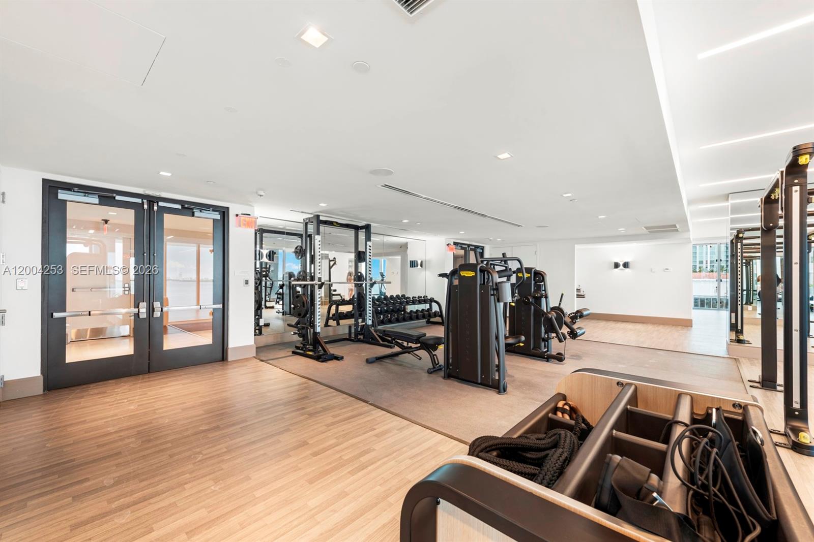 700 Northeast 26th Terrace, Unit TH403 Miami, FL 33137 - Photo 59 of 85 a view of a room with gym equipment