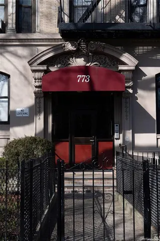 a view of a building and a street