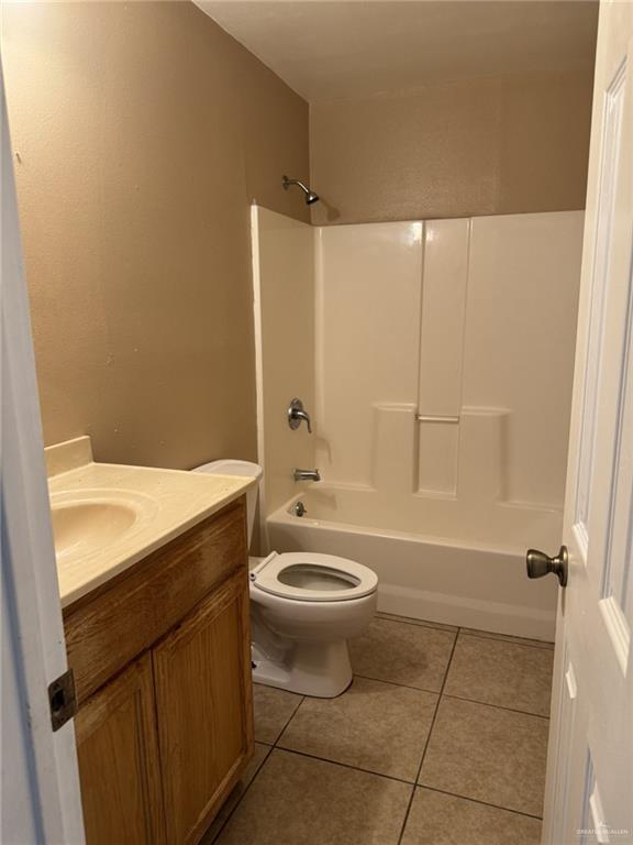 378 Ruby Red Lane Brownsville, TX 78521 - Photo 6 of 6 a bathroom with a sink a toilet and shower