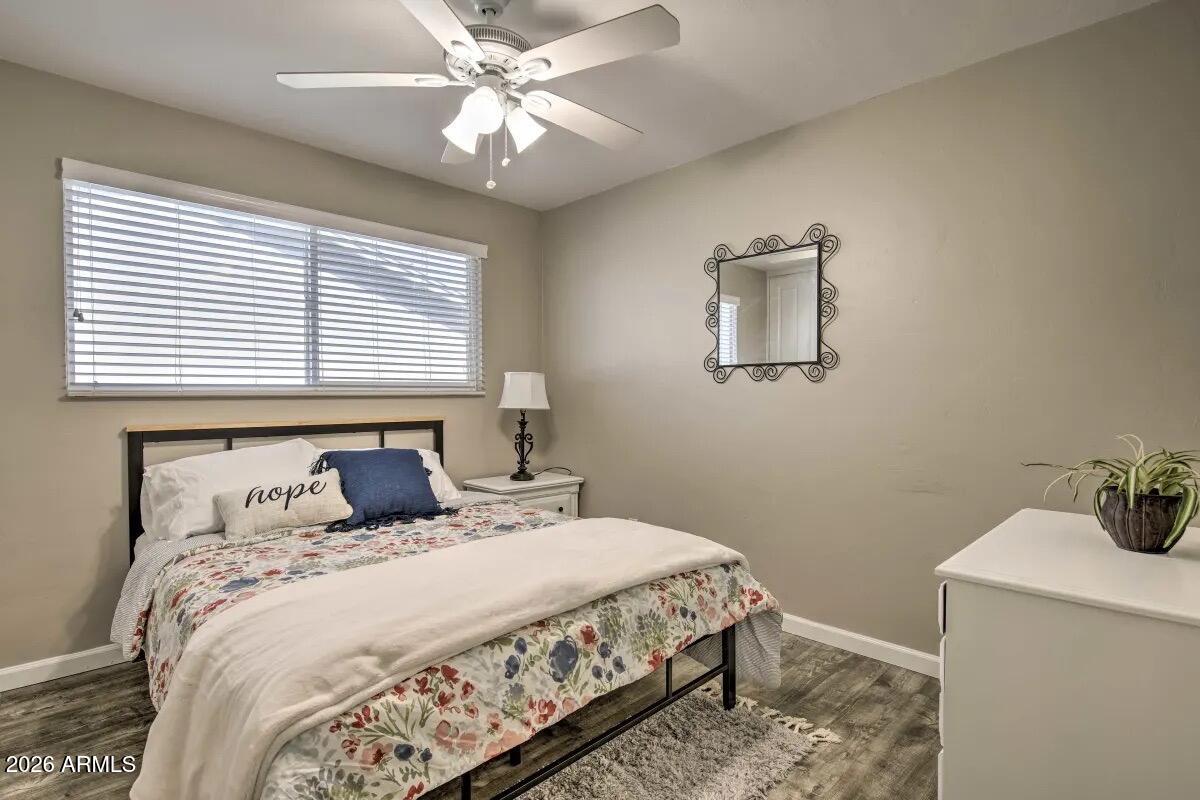 609 South Priest Drive Tempe, AZ 85281 - Photo 15 of 29 a bedroom with a bed and a window