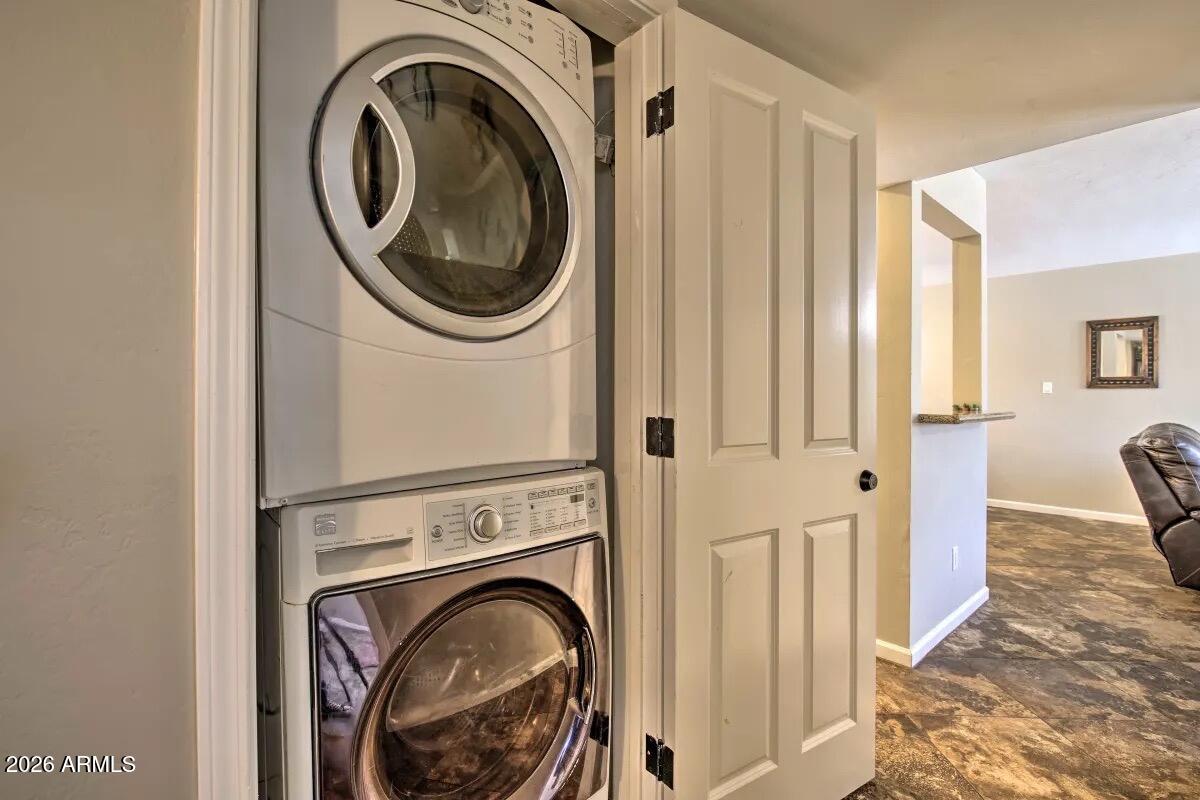 609 South Priest Drive Tempe, AZ 85281 - Photo 22 of 29 a view of a hallway with washer and dryer