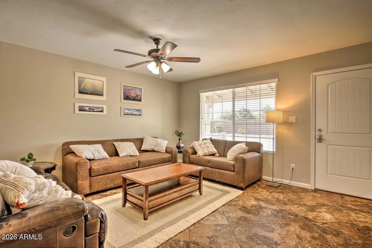 609 South Priest Drive Tempe, AZ 85281 - Photo 9 of 29 a living room with furniture and a window