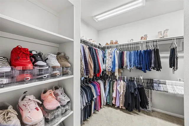 a bathroom with a tub and a shower